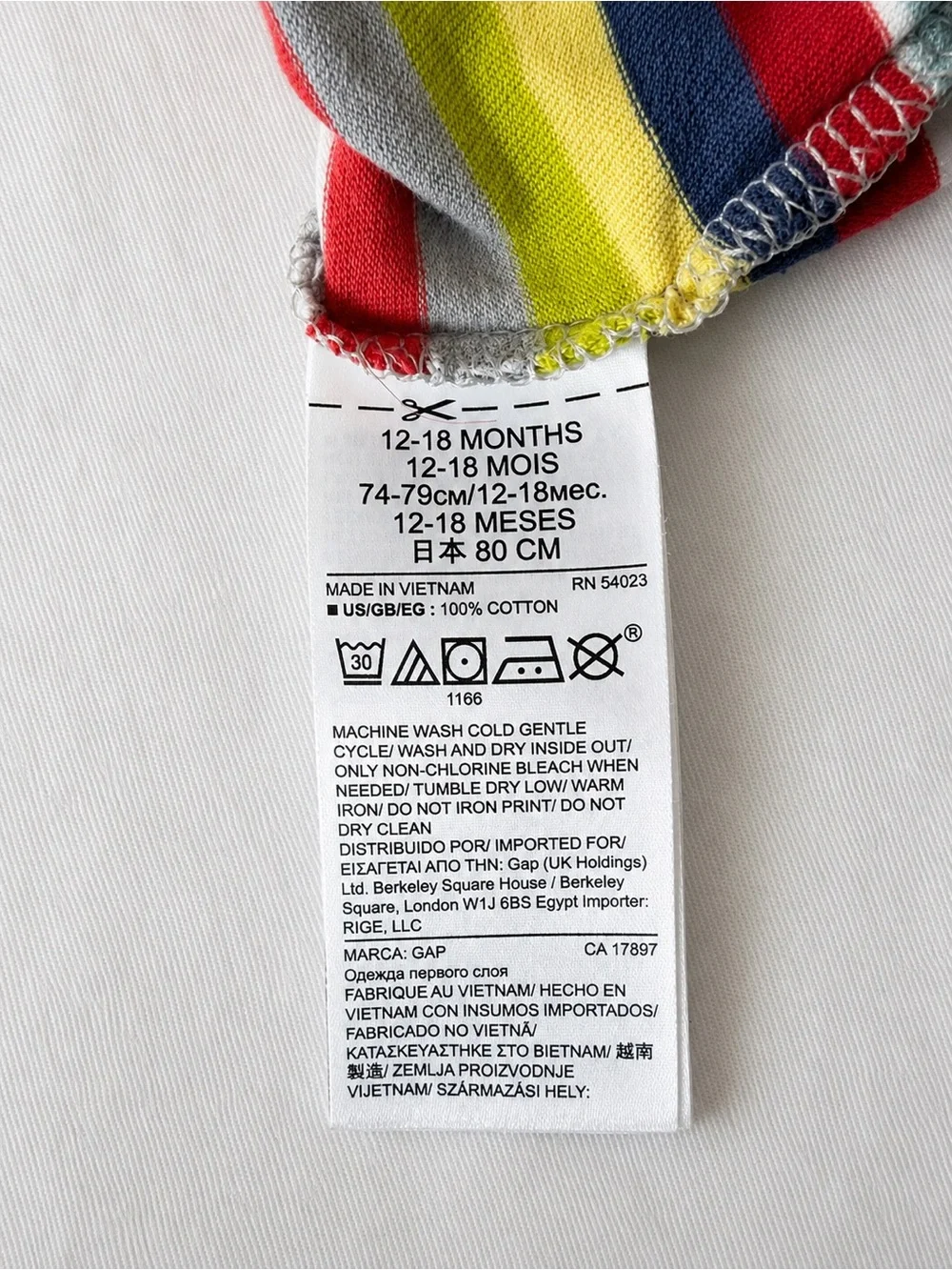 Baby GAP Rainbow Striped Long Sleeve Onesie | 12–18 Months